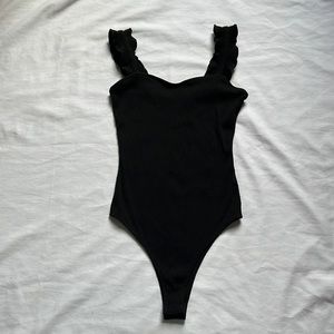 Black ribbed ruffle bodysuit